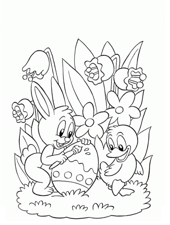 Le lapin peint un œuf de Pâques en image à imprimer