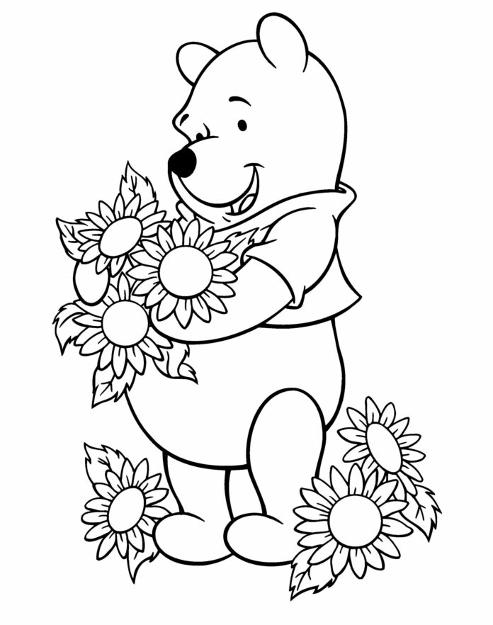 Libro da colorare stampabile di Winnie the Pooh con in mano dei girasoli